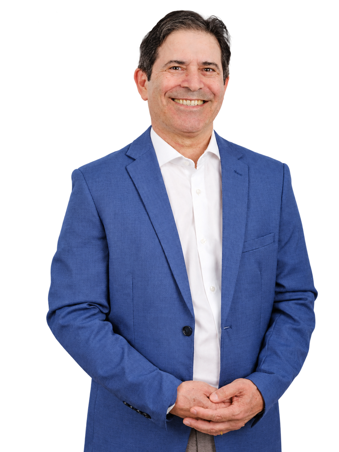 Dr. Natel sorrindo, usando blazer azul e camisa branca